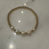 4mm gf bracelet w/ 4gf rondelle beads and 5 white pearls